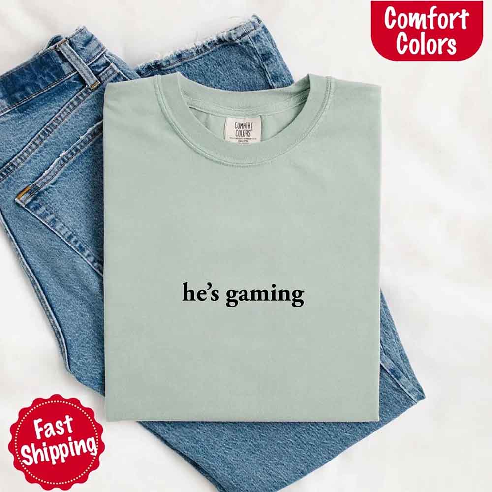 He’s Gaming – Funny Relationship Comfort Color Shirt for Her