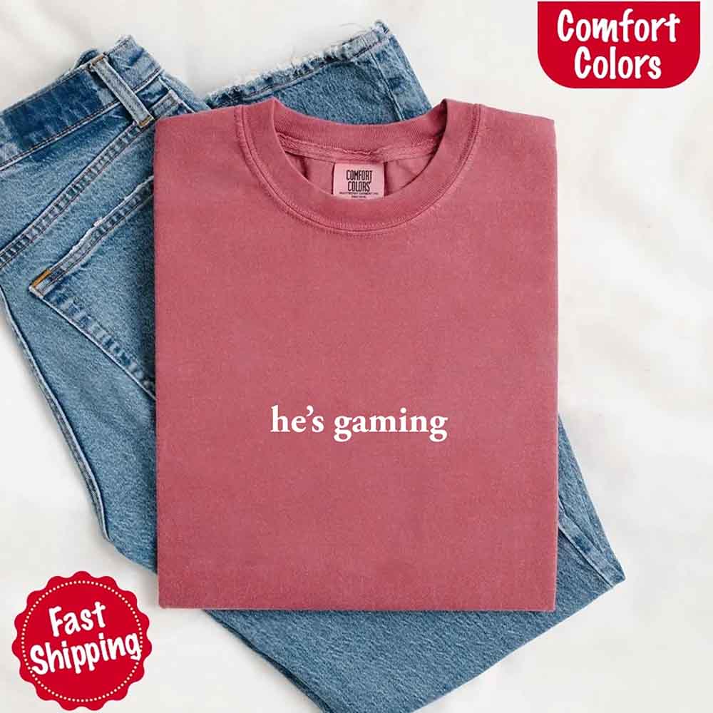 He’s Gaming – Funny Relationship Comfort Color Shirt for Her