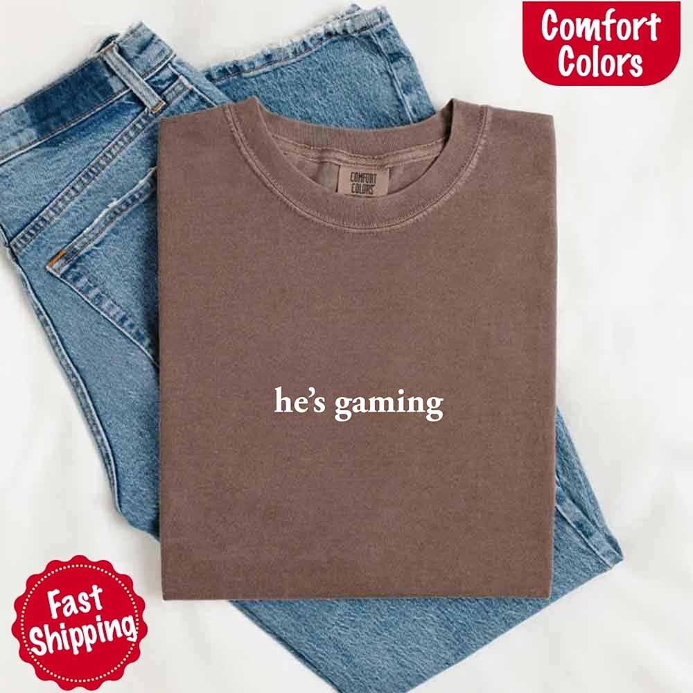 He’s Gaming – Funny Relationship Comfort Color Shirt for Her